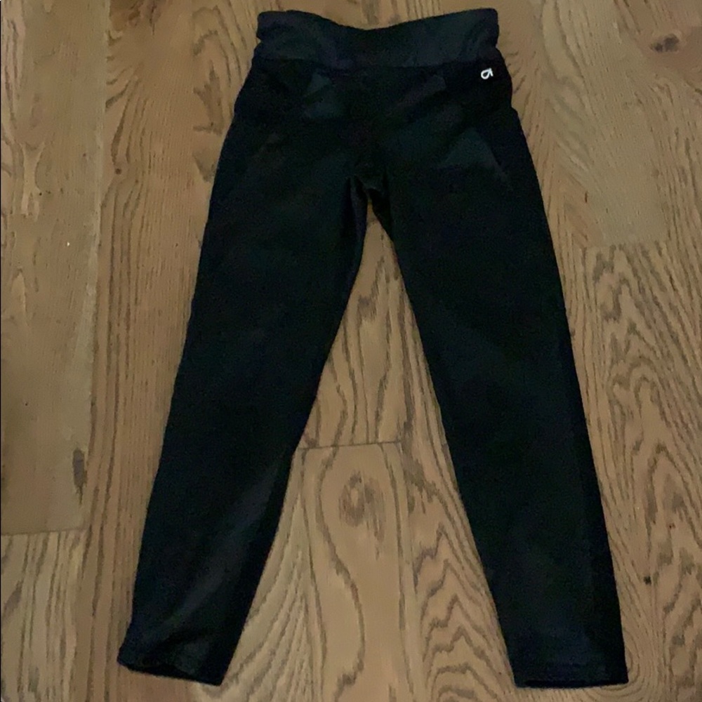 Black Capri leggings with shiny accents